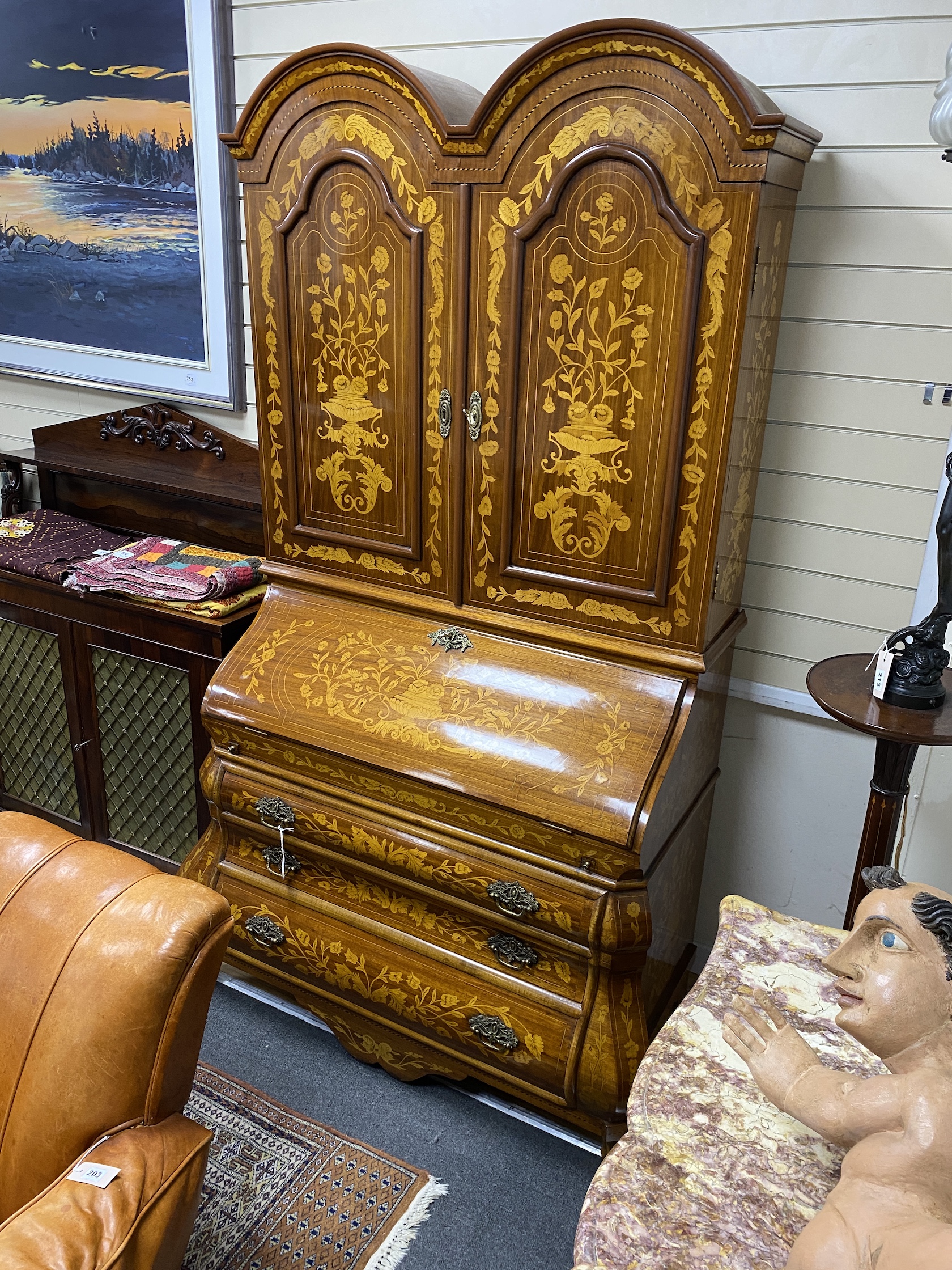 An 18th century style Dutch design marquetry inlaid bombe bureau cabinet, width 110cm, depth 64cm, height 208cm